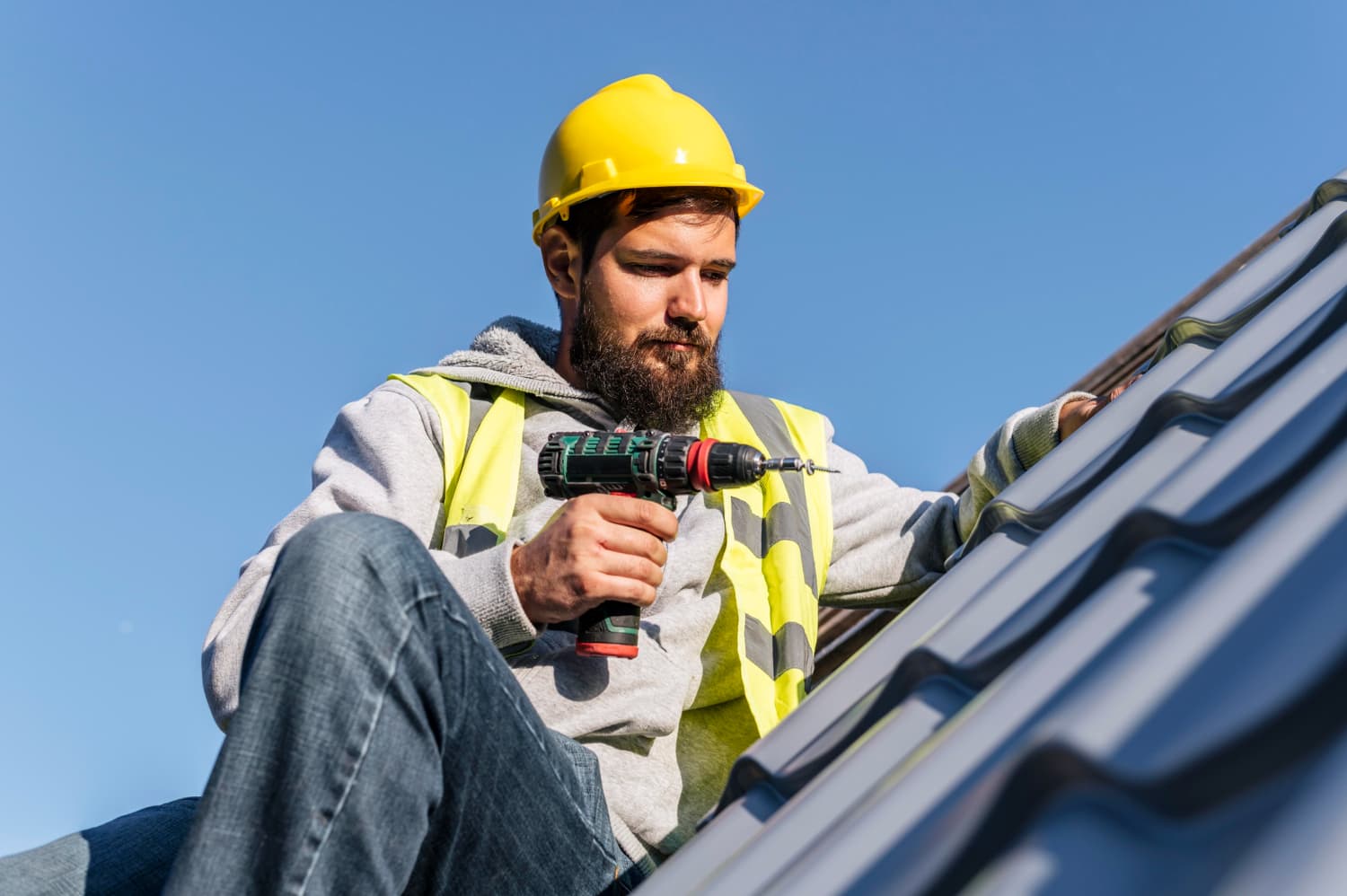 Summit Shield craftsman installing roofing with precision